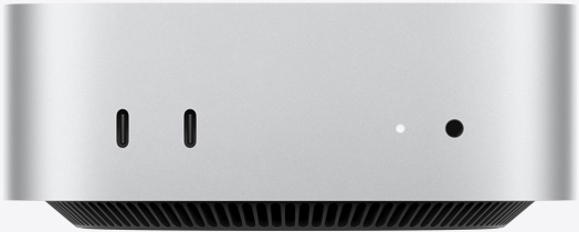 Apple Mac mini with front ports and a black ventilation base